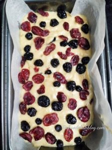 berry banana bread batter in the loaf tin-step by step picture of berry banana bread