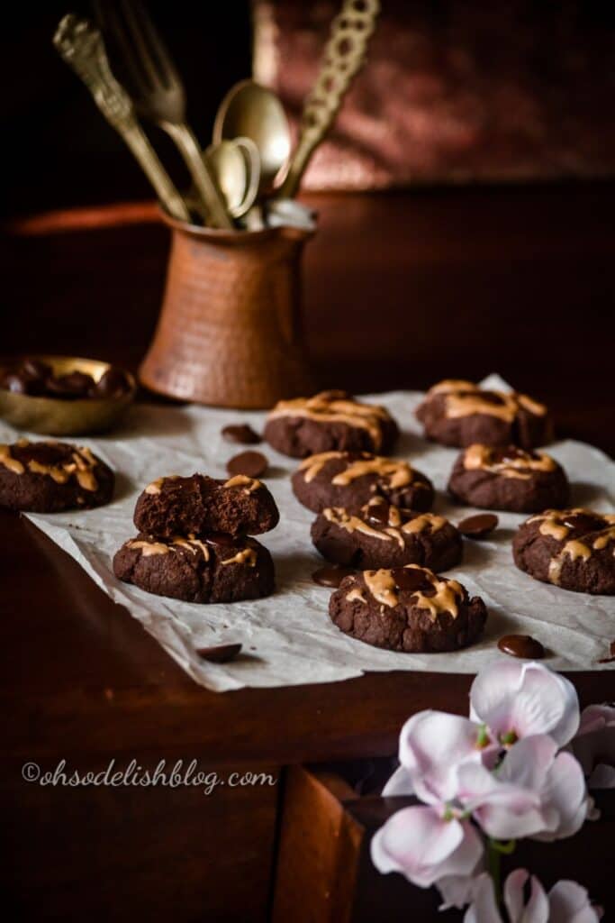 chocolate cookies on white paper on a table