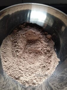 cream colour flour in a steel bowl