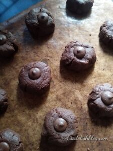 unbaked chocolate cookies on a cookie sheet